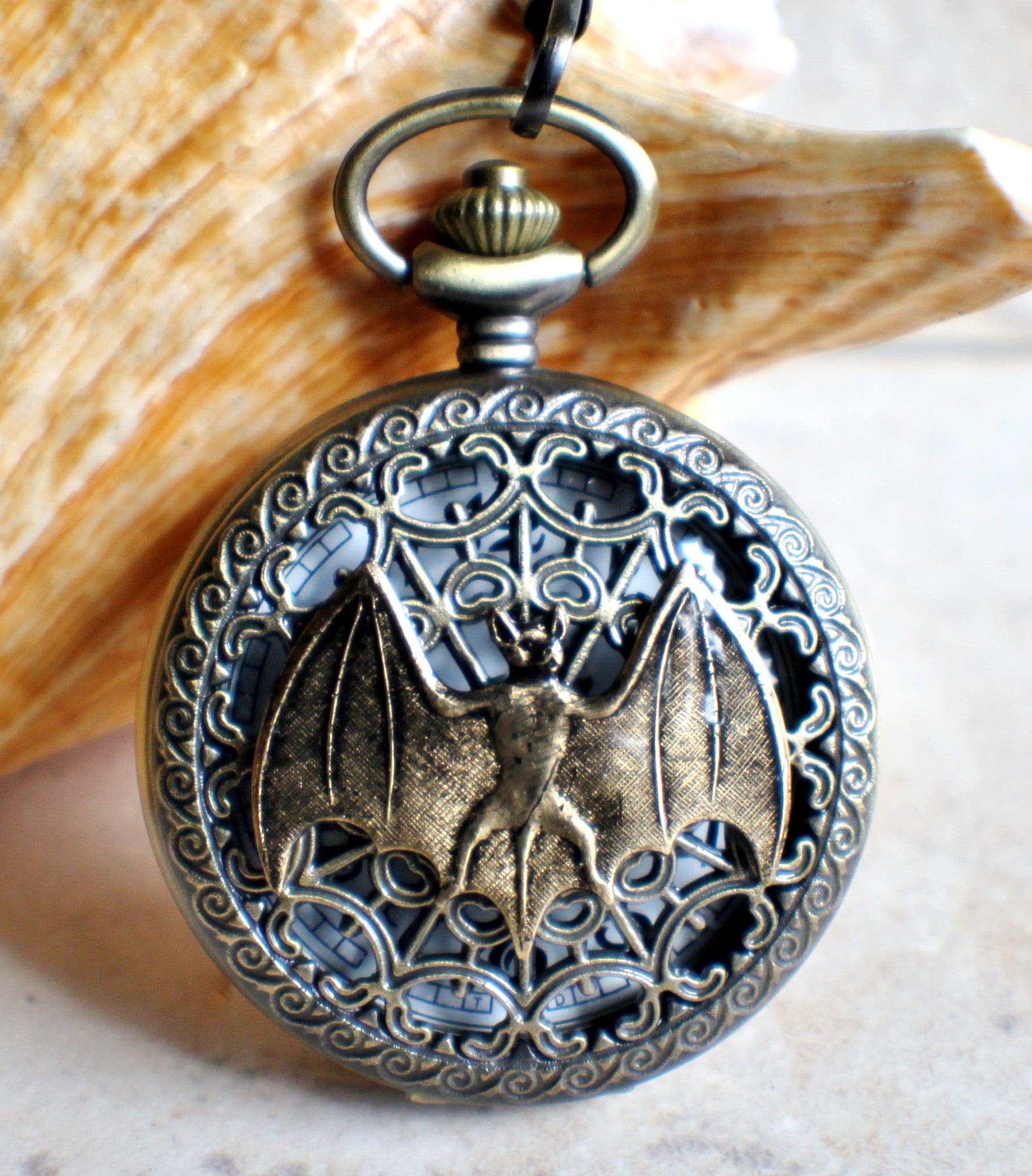 IMG_1045.jpg Bat battery operated pocket watch in bronze. - Image 1