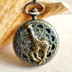 Giraffe battery operated pocket watch in bronze.