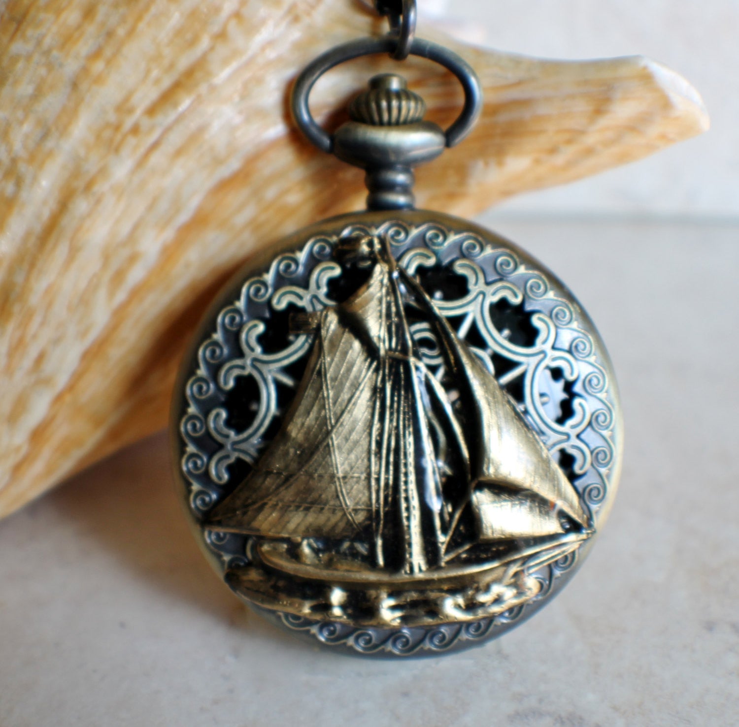 il_fullxfull.1055696706_a8xl.jpg Nautical battery operated pocket watch with sailboat - Image 1